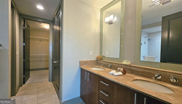 bathroom featuring vanity, tile patterned flooring, and a wall unit AC