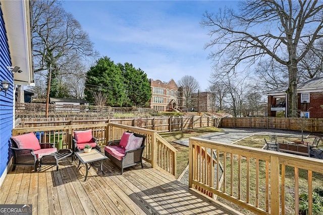 wooden terrace featuring an outdoor living space