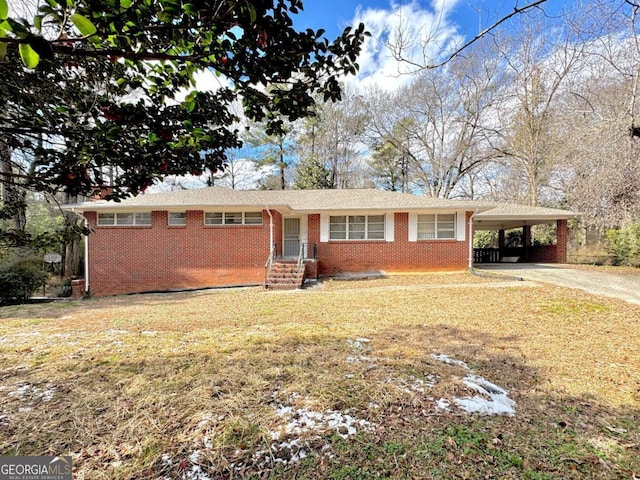 ranch-style house with a carport