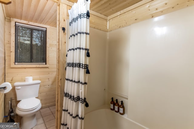 bathroom featuring shower / tub combo, toilet, tile patterned floors, wooden walls, and wood ceiling