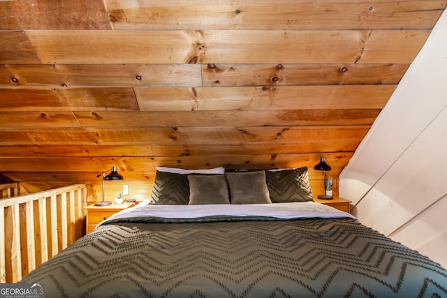 unfurnished bedroom featuring wood walls