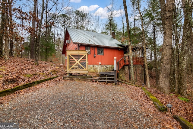 30 Cheyenne Trl, Blue Ridge, GA 30513 - back of house featuring a wooden deck, stairs, and metal roof