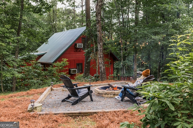 30 Cheyenne Trl, Blue Ridge, GA 30513 - view of yard featuring a wall unit AC and an outdoor fire pit
