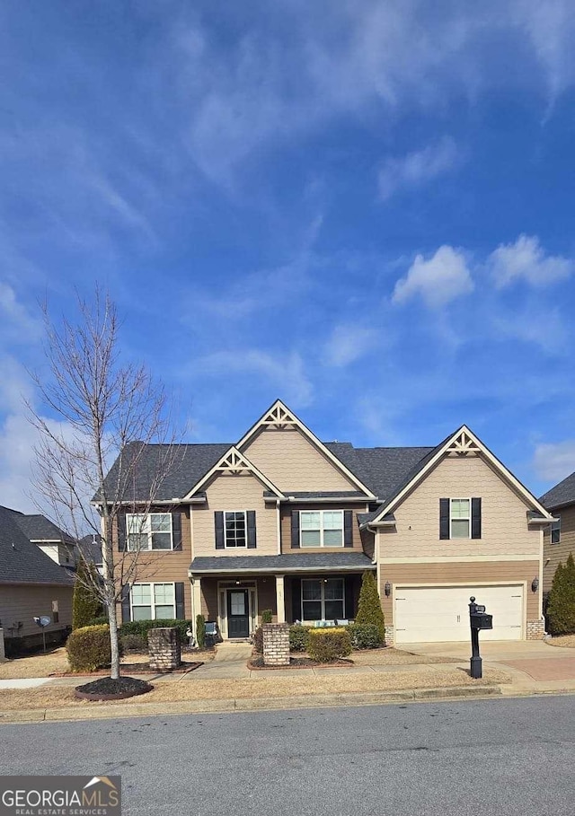 view of front of property with a garage