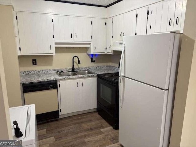 kitchen featuring white cabinetry, white appliances, dark wood-type flooring, and sink