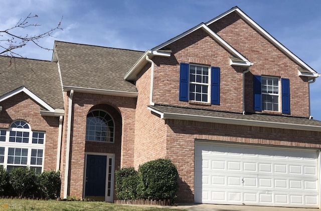 view of front property with a garage