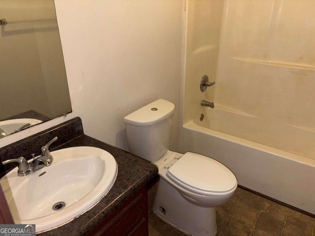 full bathroom with shower / tub combination, vanity, and toilet