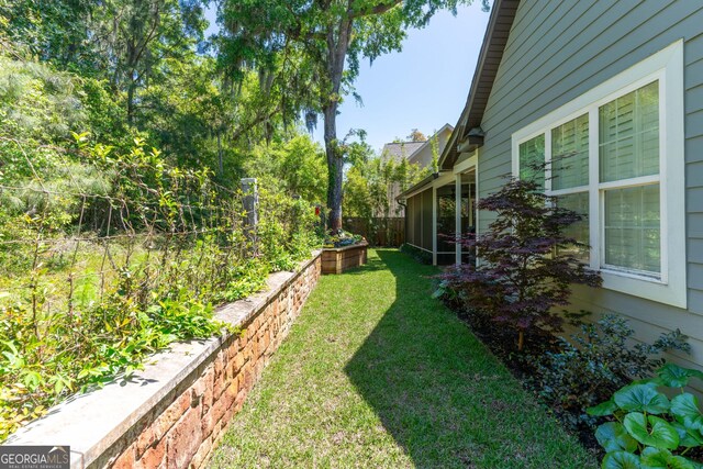 view of yard with fence