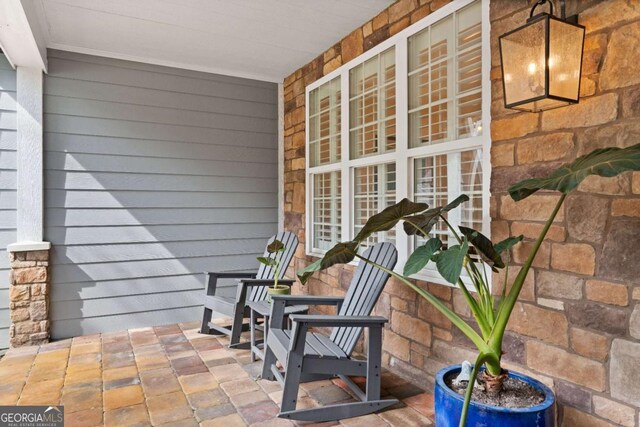 balcony featuring covered porch