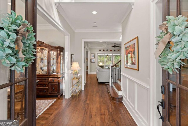 foyer featuring dark wood-style flooring, recessed lighting, stairway, crown molding, and a ceiling fan