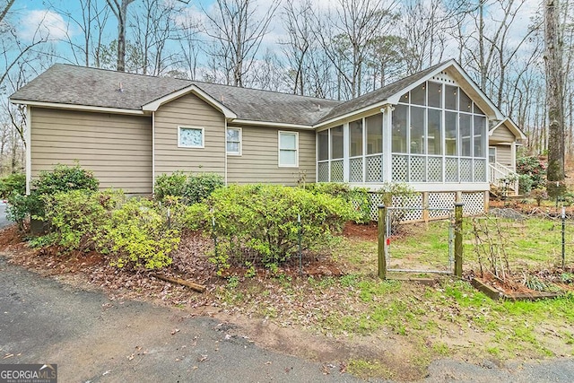 exterior space with a sunroom