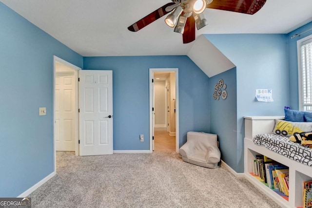 carpeted bedroom featuring ceiling fan and baseboards