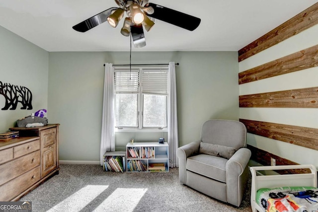 bedroom with ceiling fan, baseboards, and light colored carpet