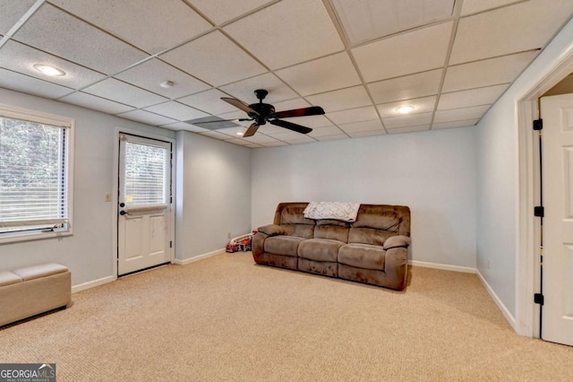 living room with light carpet, baseboards, a drop ceiling, ceiling fan, and recessed lighting