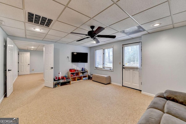 game room featuring light carpet, a paneled ceiling, visible vents, and baseboards