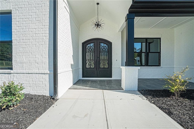 doorway to property featuring french doors