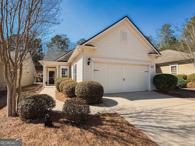 view of front of property with an attached garage and driveway