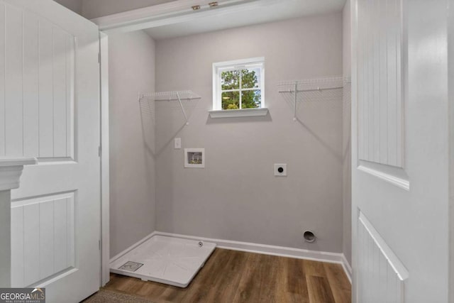 65 Patterson Dr, Franklin, GA 30217 - laundry area featuring electric dryer hookup, wood finished floors, washer hookup, and baseboards