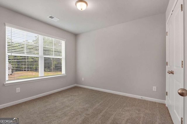 unfurnished bedroom featuring carpet