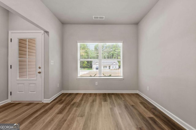 foyer with dark wood-type flooring