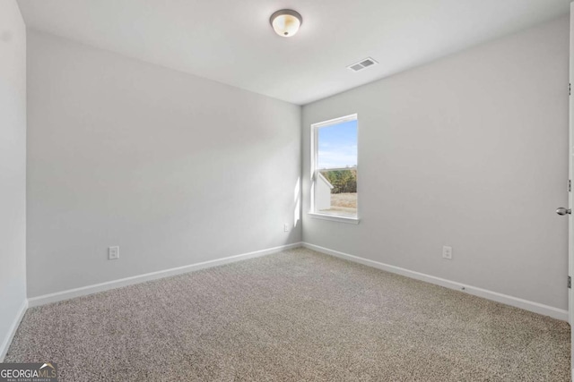 view of carpeted spare room