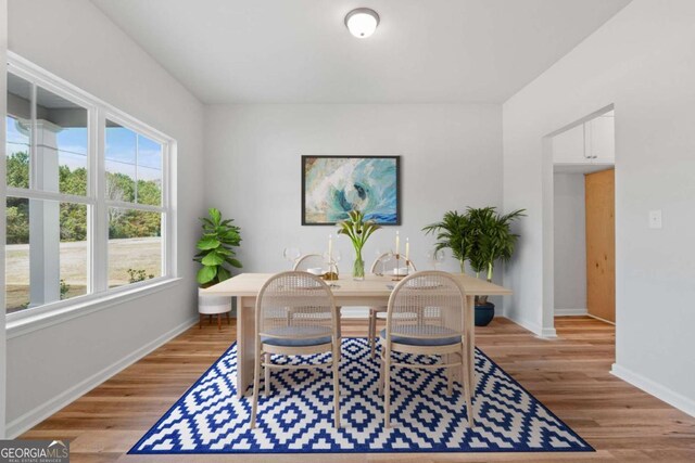 65 Patterson Dr, Franklin, GA 30217 - dining space featuring baseboards and light wood-style floors