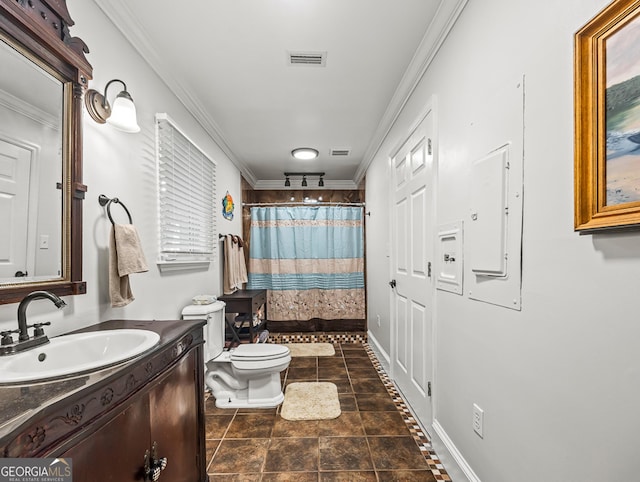 bathroom with a shower with curtain, ornamental molding, vanity, and toilet