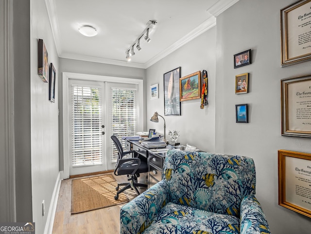 office area featuring french doors, ornamental molding, rail lighting, and wood-type flooring