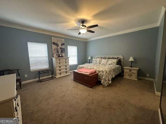 bedroom featuring ornamental molding, carpet, and ceiling fan