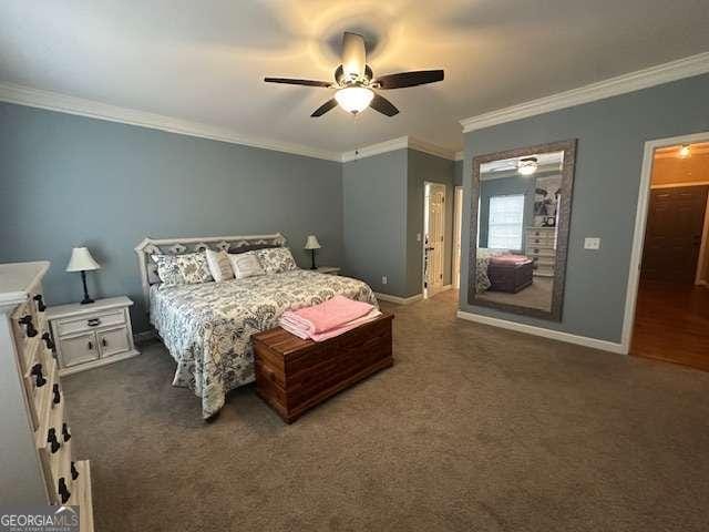 carpeted bedroom featuring crown molding and ceiling fan