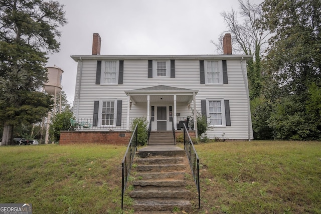 colonial house with a front lawn