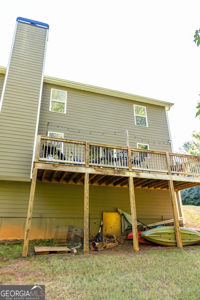 rear view of property with a deck