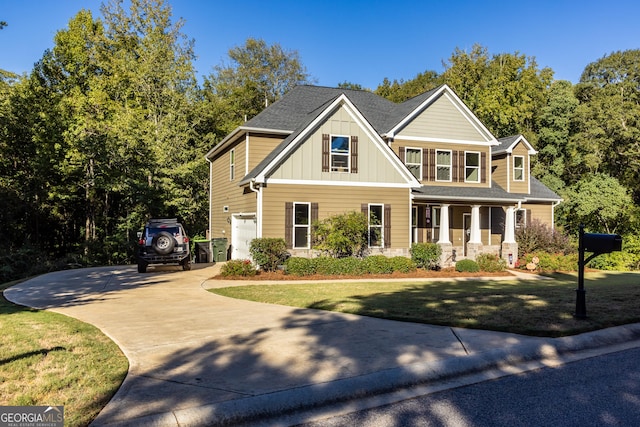 view of front of home with a front yard and covered porch