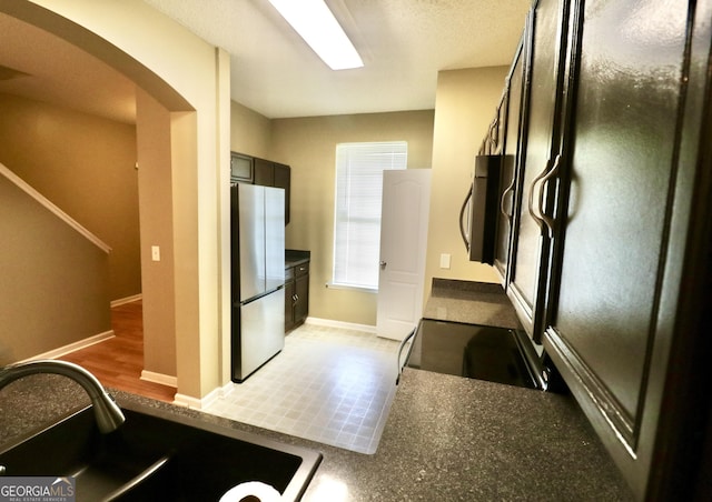 kitchen with appliances with stainless steel finishes and sink