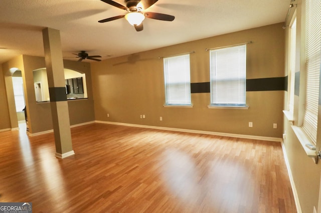 interior space featuring light hardwood / wood-style flooring and ceiling fan