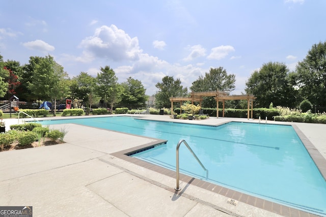 view of pool featuring a pergola and a patio area