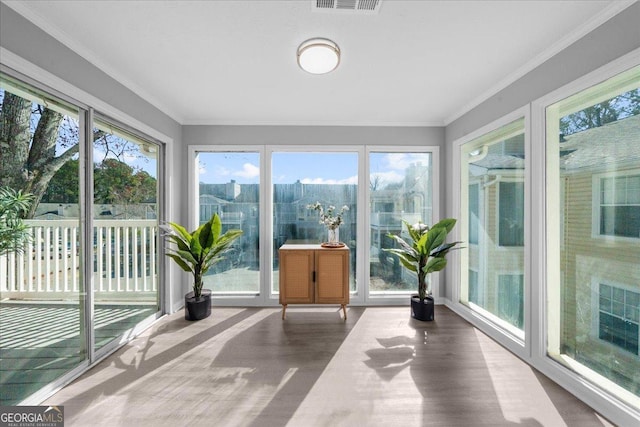 sunroom / solarium with a healthy amount of sunlight