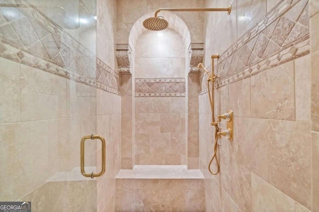 bathroom with an enclosed shower