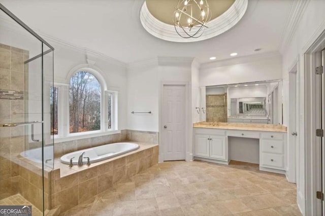 bathroom featuring vanity, a notable chandelier, crown molding, and shower with separate bathtub