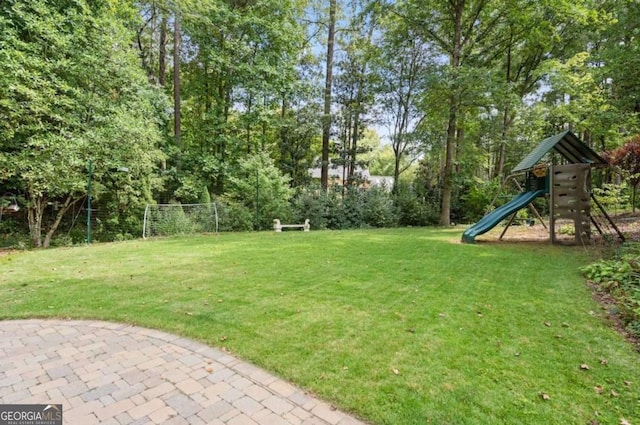 view of yard featuring a playground