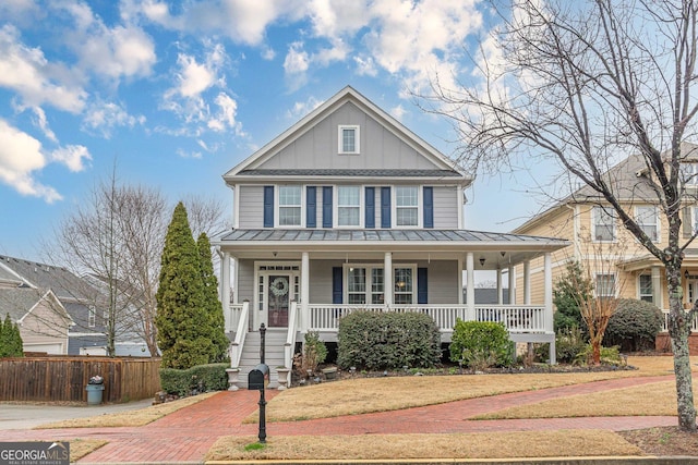 view of front of property with a front lawn and a porch