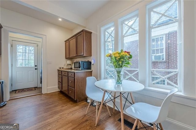 dining room featuring hardwood / wood-style flooring