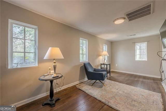 sitting room with dark hardwood / wood-style floors