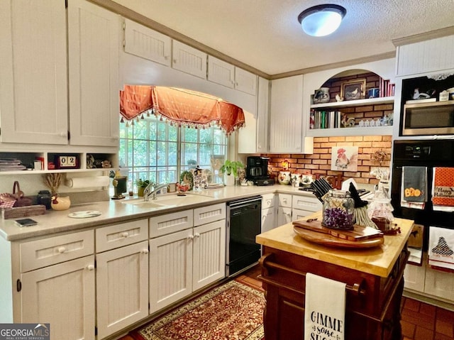 kitchen featuring sink, dishwasher, white cabinetry, a textured ceiling, and decorative backsplash