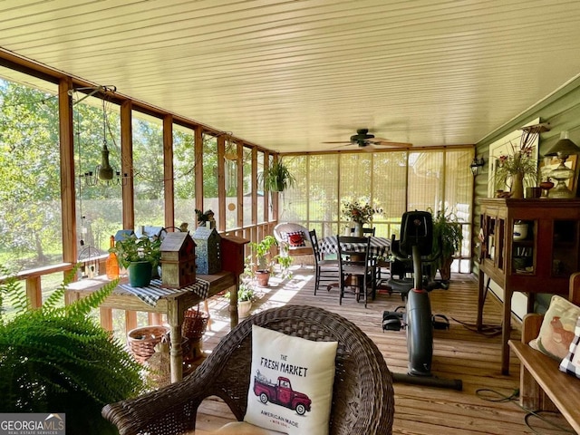 sunroom / solarium with ceiling fan