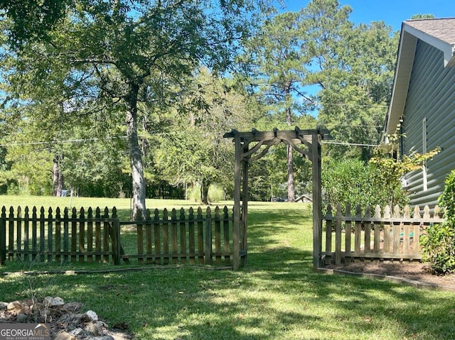 view of yard with a pergola