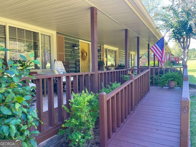 wooden deck with a porch