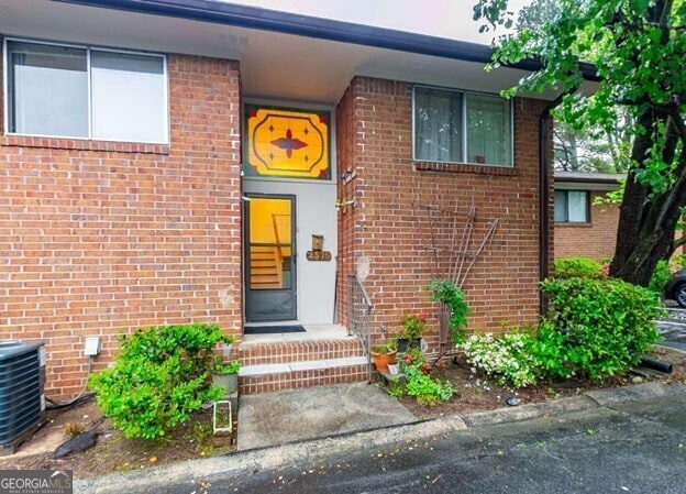 entrance to property with cooling unit