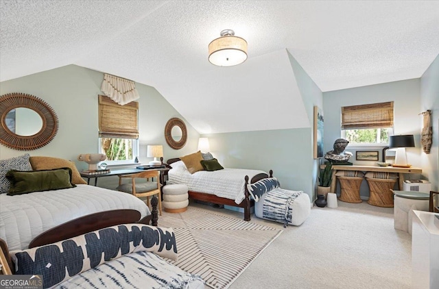 carpeted bedroom featuring vaulted ceiling and a textured ceiling