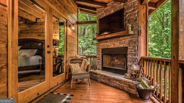 exterior space with an outdoor stone fireplace